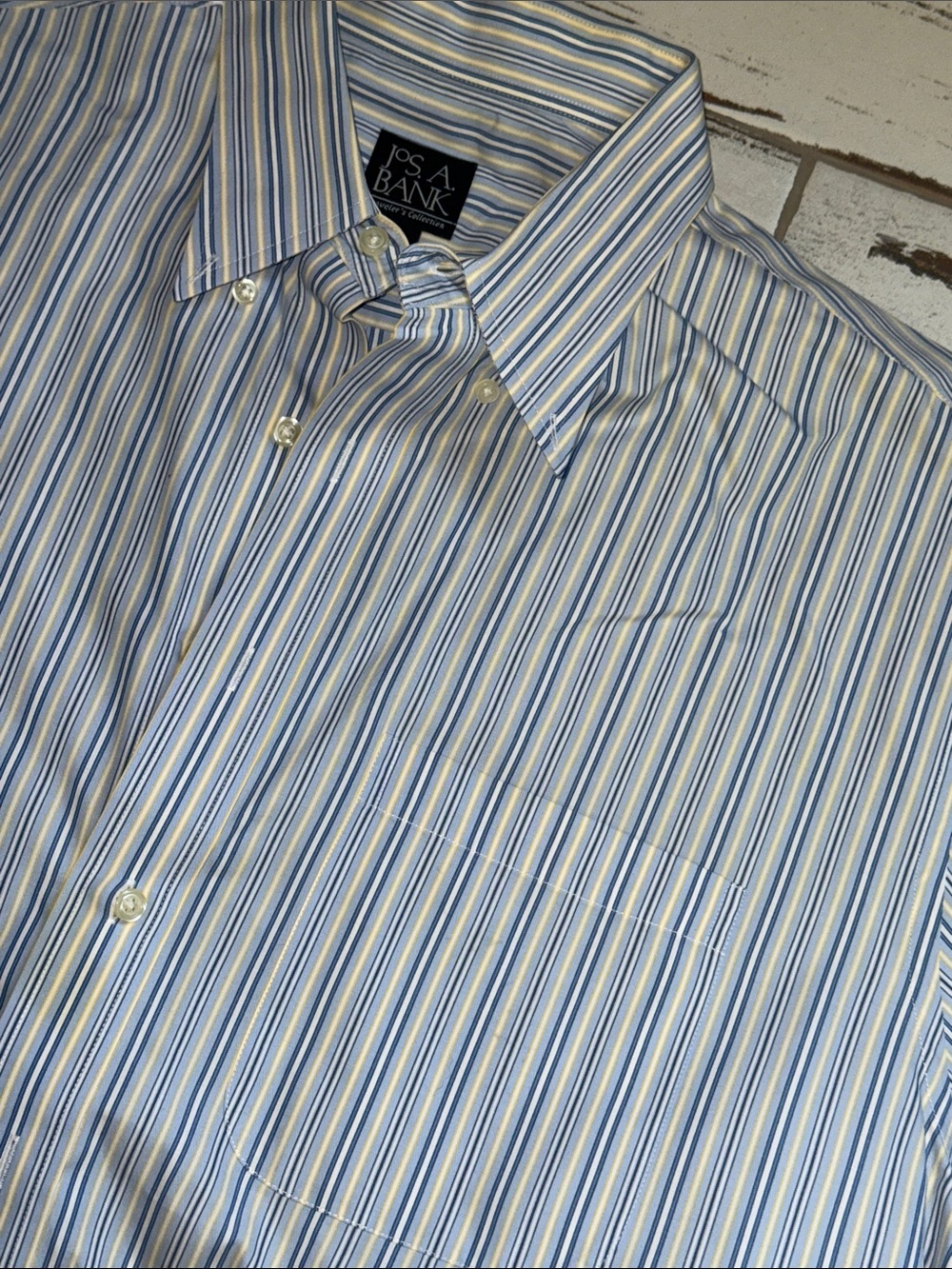 Men’s Jo’s. A Bank short sleeve shirt. Blue with pale yellow stripes